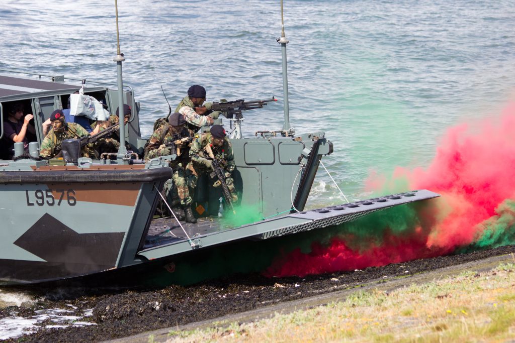 Naval forces operating from a landing craft during maritime security and coastal defense operations